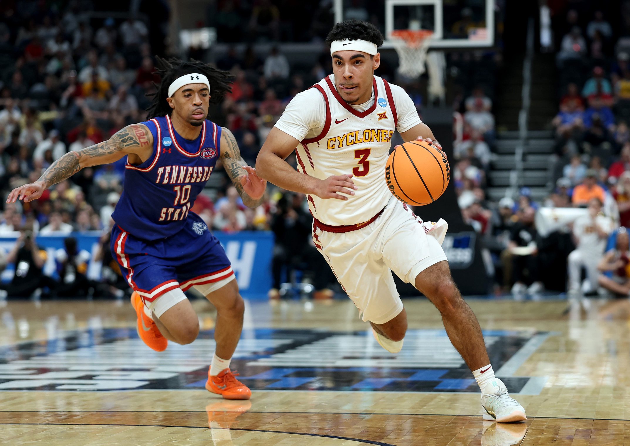 Iowa State guard Tamin Lipsey drives to the basket against Tennessee State guard Dante Harris during the first round of the 2026 NCAA men's basketball tournament at Enterprise Center on March 20, 2026 in St Louis.