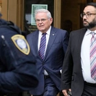 Newly released photos depict cash and gold bars seized from Sen. Bob Menendez's home