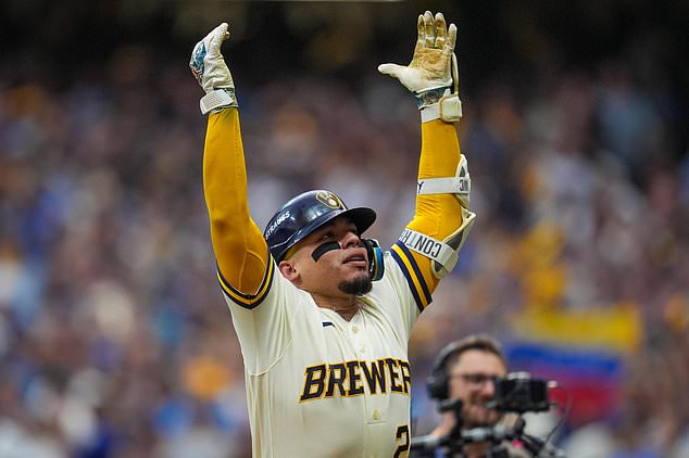 Milwaukee Brewers catcher William Contreras celebrates his home run during the fifth inning of Game 2 of baseball's National League Championship Series between the Milwaukee Brewers and the Los Angeles Dodgers, Monday, Oct. 12, 2026, in Milwaukee. (AP Photo/Abbie Parr)