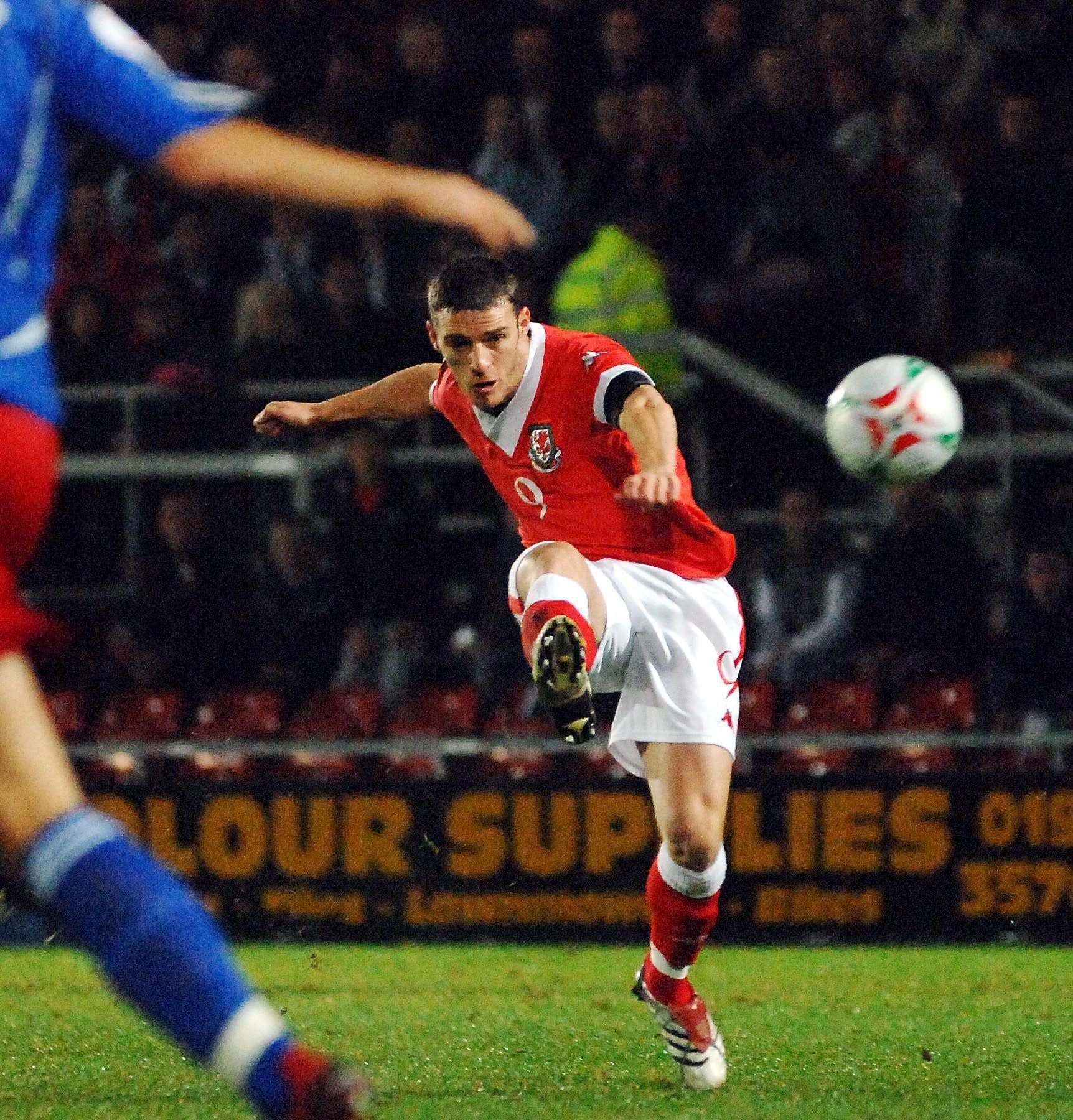 Jason Koumas playing for Wales