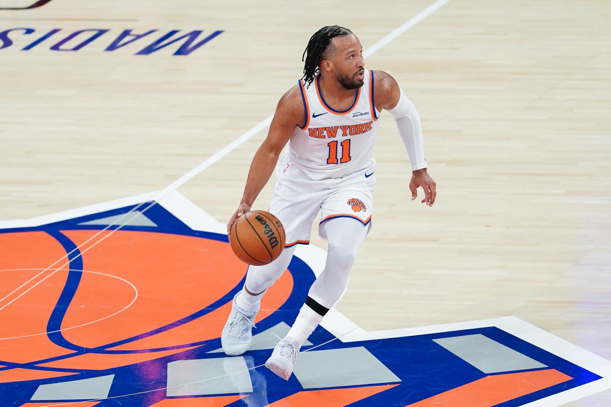 New York Knicks guard Jalen Brunson (11) brings the ball up court against the Washington Wizards at Madison Square Garden.