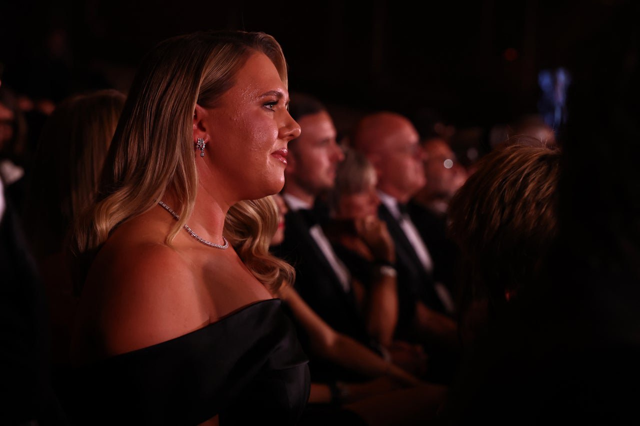 Harry Kane's wife Katie Goodland watches from her seat as Kane is awarded the Ballon d'Or (AFP/Getty)
