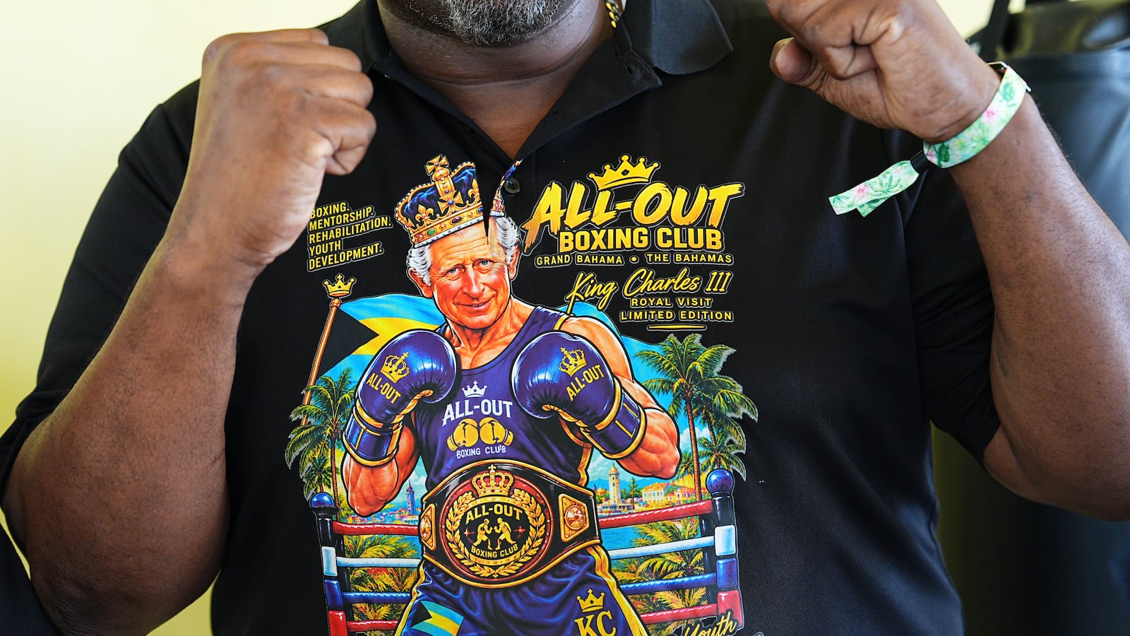 A T-shirt featuring an illustration depicting the King as a boxer, ahead of his visit to a boxing academy