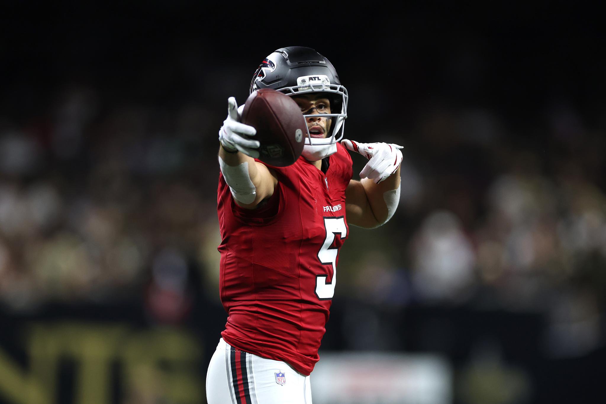 Drake London of the Atlanta Falcons celebrates a first down against the New Orleans Saints.