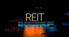 REIT Real Estate Investment Trust banner. REIT definition, neon concept, marketing, technology. 3D render