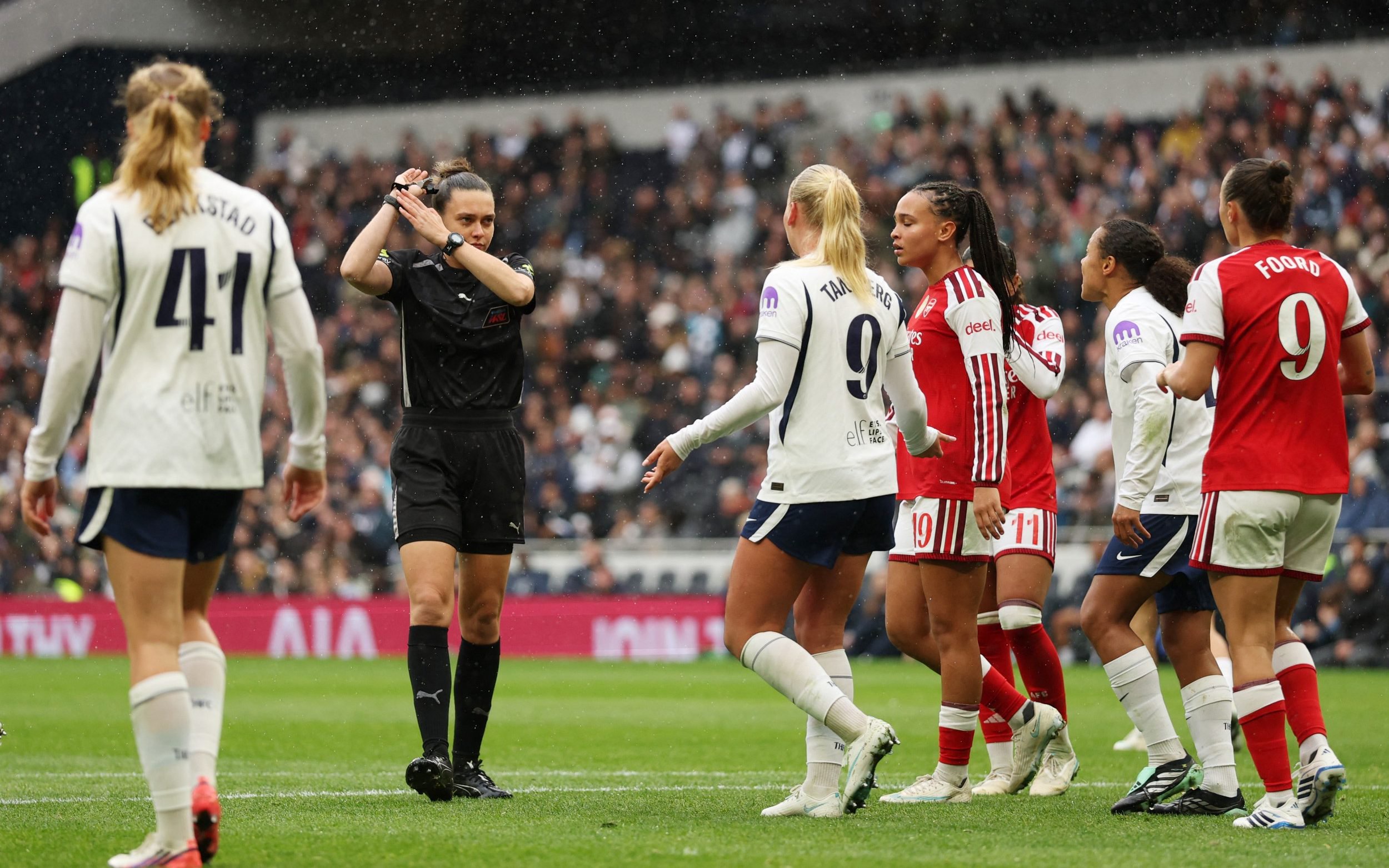 Referee Phoebe Cross awards Arsenal a penalty