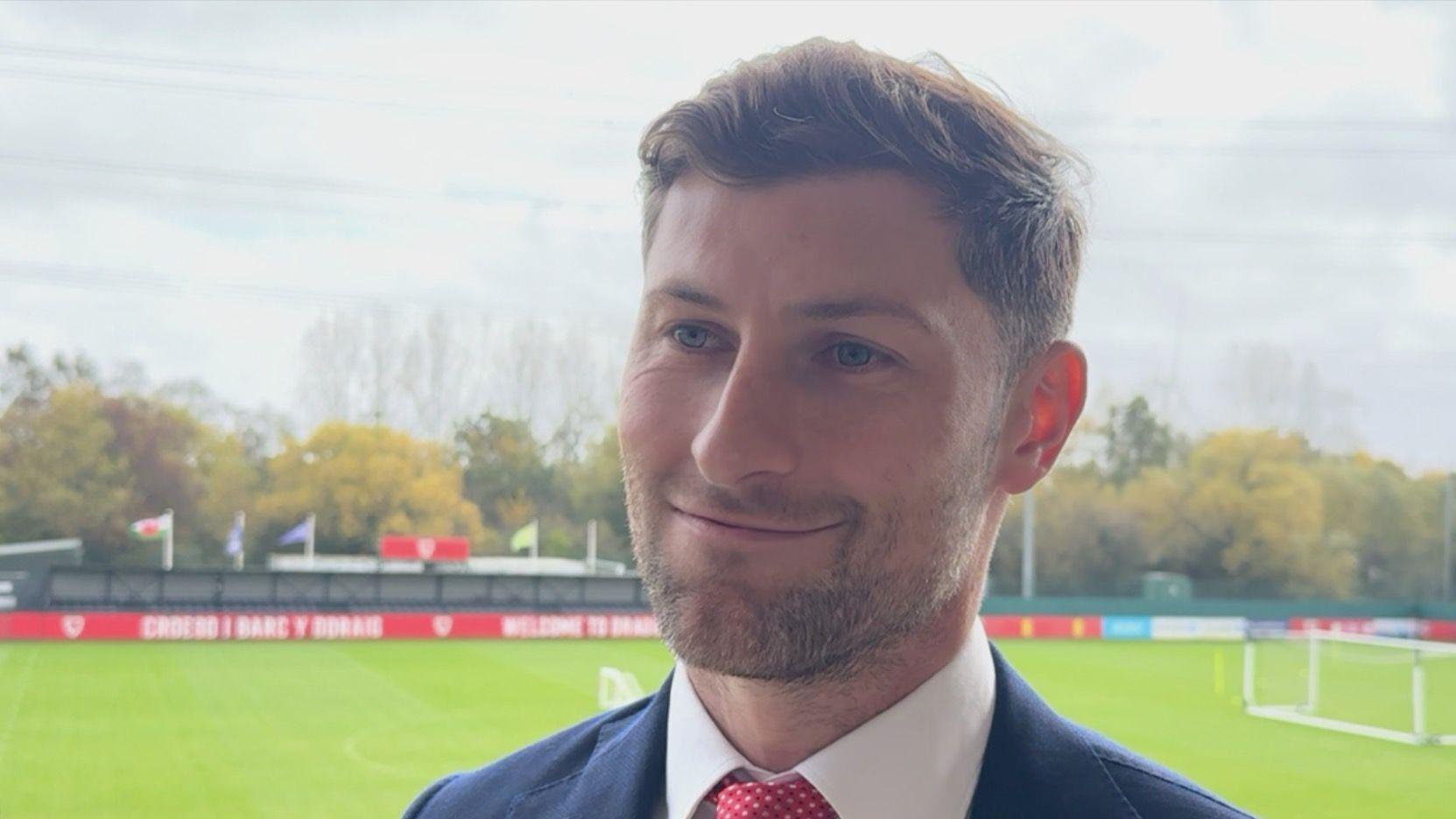 Ben Davies is pictured smiling at Dragon Park in Newport.