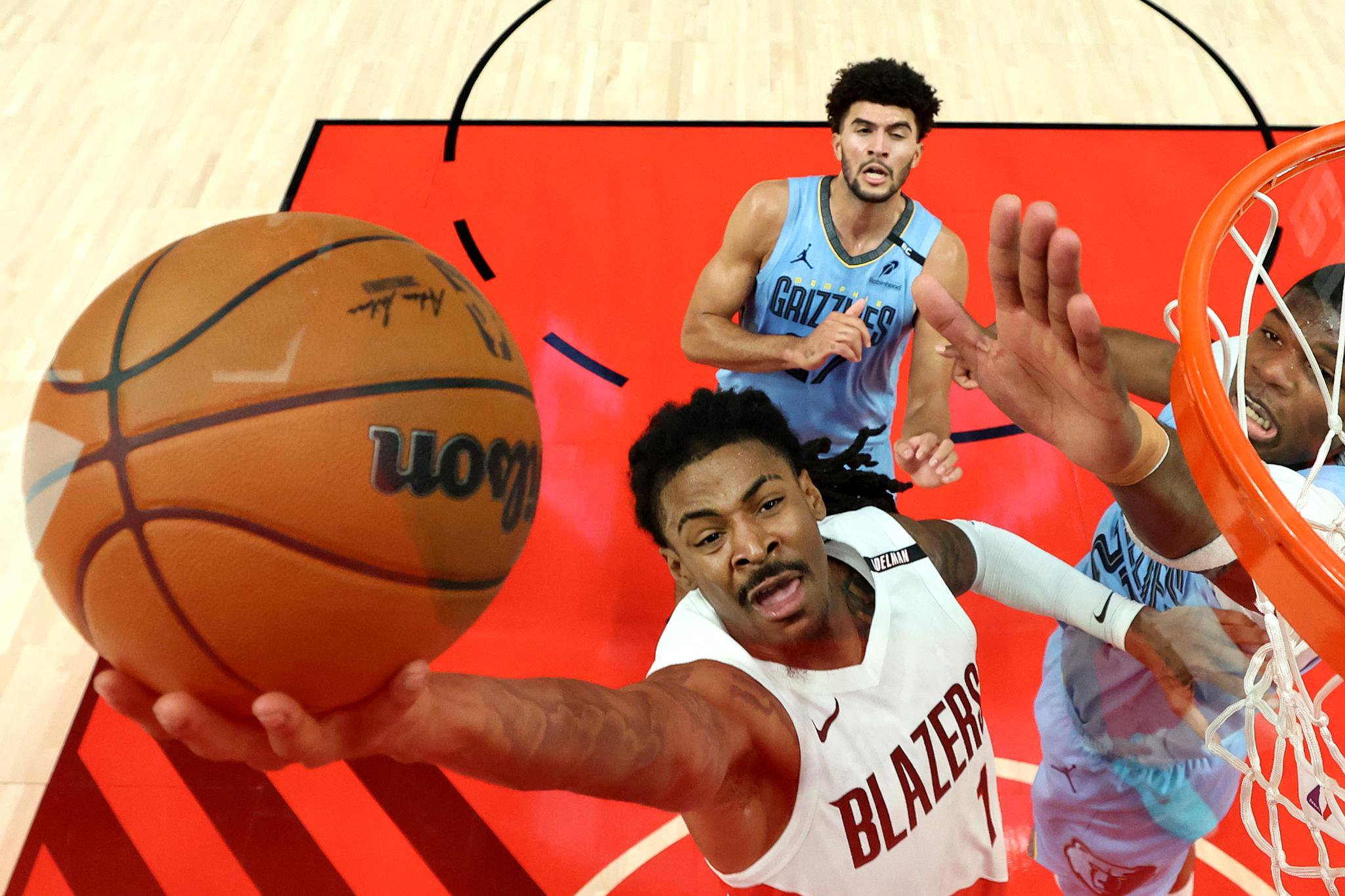 Ja Morant finished with 14 points against his former team. 