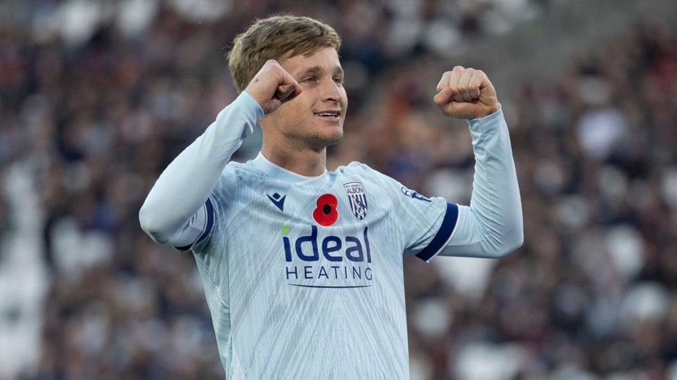 Jimm-Jay Morgan celebrates his goal with clenched fists