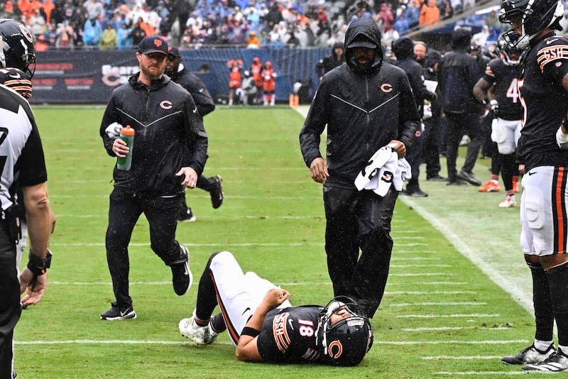 FILE PHOTO: Sep 20, 2026; Chicago, Illinois, USA;  Chicago Bears quarterback Caleb Williams (18) lies on the field with an apparent injury against the Minnesota Vikings during the second half at Soldier Field.  Mandatory Credit: Matt Marton-Imagn Images/File Photo