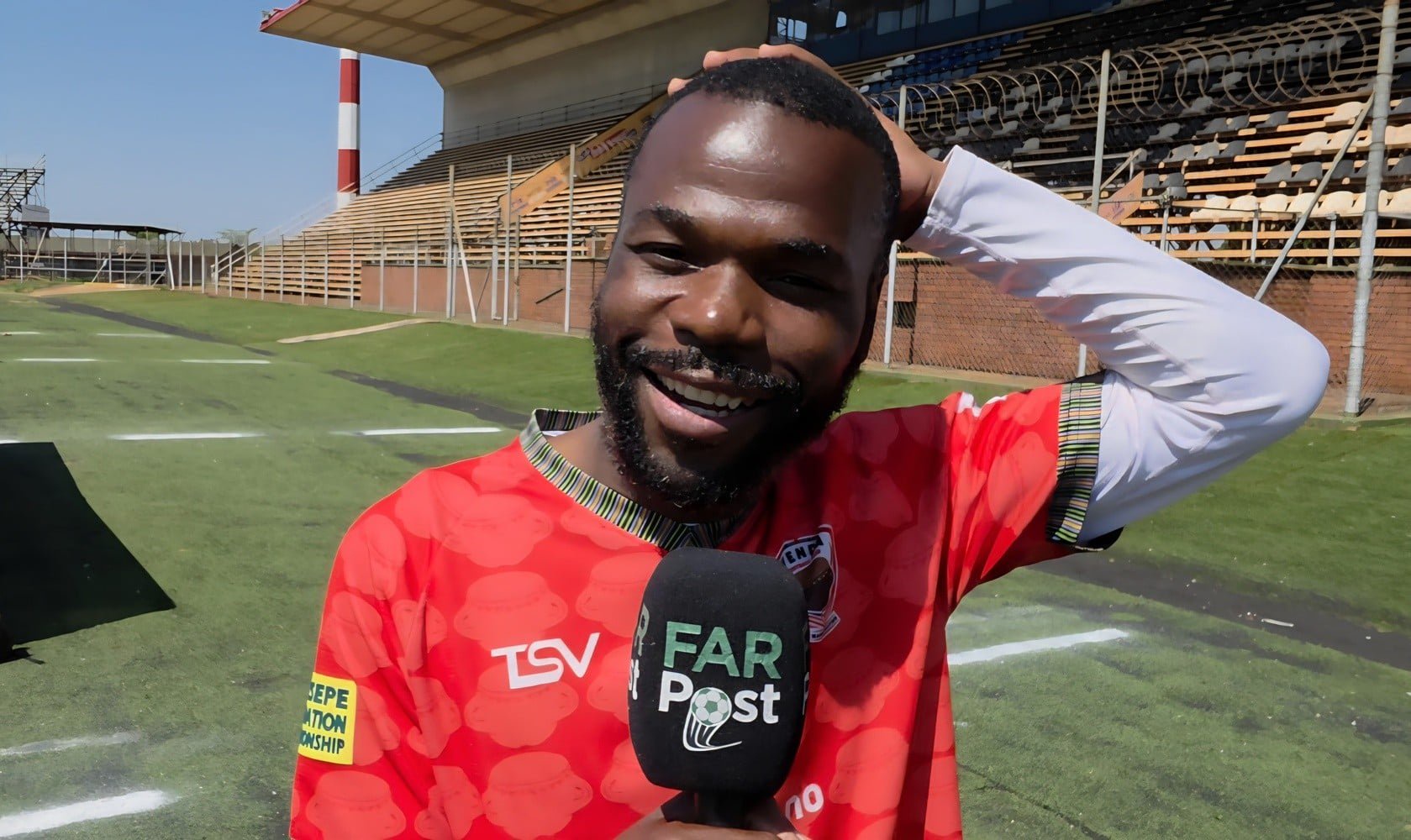 Knox Mutizwa holding his head while talking to FARPost in Thohoyandou.