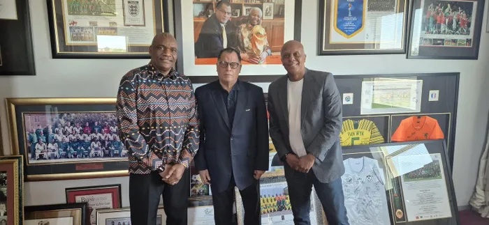 Doctor Khumalo (r) with president Danny Jordaan (m) and technical director Molefi Ntseki (l)  after taking the Safa vice-chairperson technical committee role.