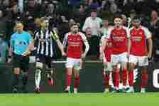 orginho, Declan Rice and William Saliba of Arsenal look dejected as Anthony Gordon of Newcastle United celebrates after scoring the team's first goal during the Premier League match between Newcastle United and Arsenal FC at St. James Park on November 04, 2023 in Newcastle upon Tyne, England