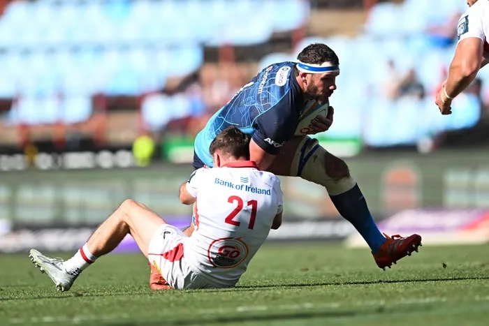 Marcell Coetzee, Vodacom Bulls captain, challenged by Matthew Devine of Ulster during the United Rugby Championship. Coetzee could be miss the URC match against the Scarlets if a disciplinary hearing on Wednesday finds him guilty for a cleanout incident against Ulster.