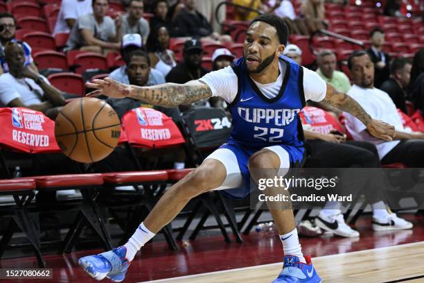 Las vegas nevada xavier moon of la clippers reaches for the ball against the utah jazz during