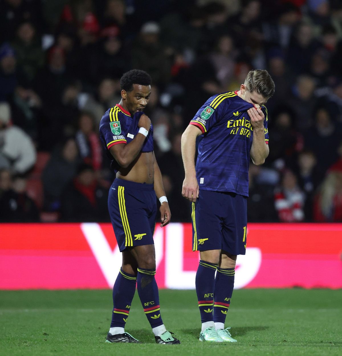 Arsenal's dejected players