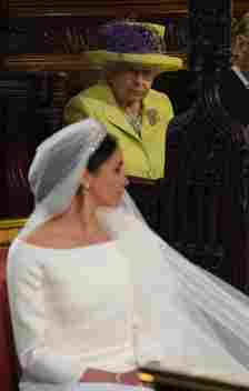 Queen Elizabeth II looks at Meghan Markle during her wedding ceremony to Prince Harry