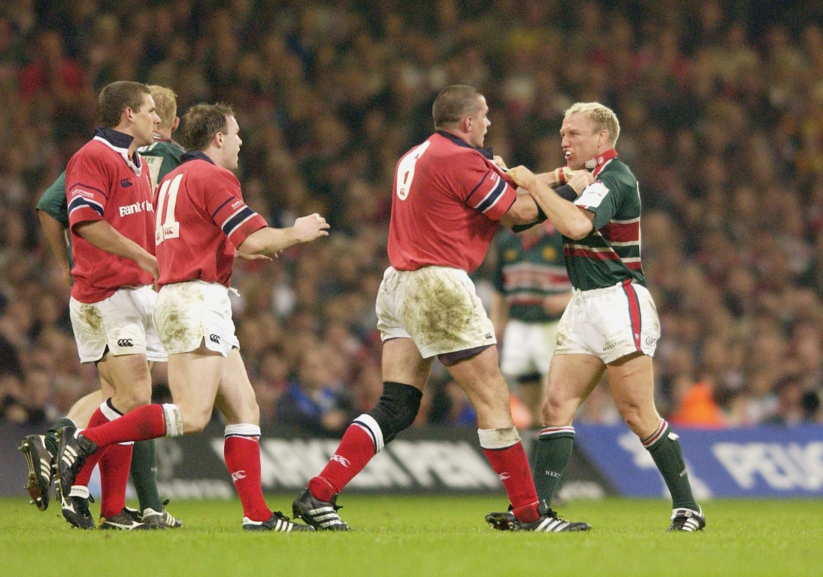 Neil Back (right) of Leicester tussles with  Alan Quinlan of Munster during the Heineken Cup Final at the Millennium Stadium, Cardiff, Wales, May 25th, 2002. Photograph:  David Rogers/Getty