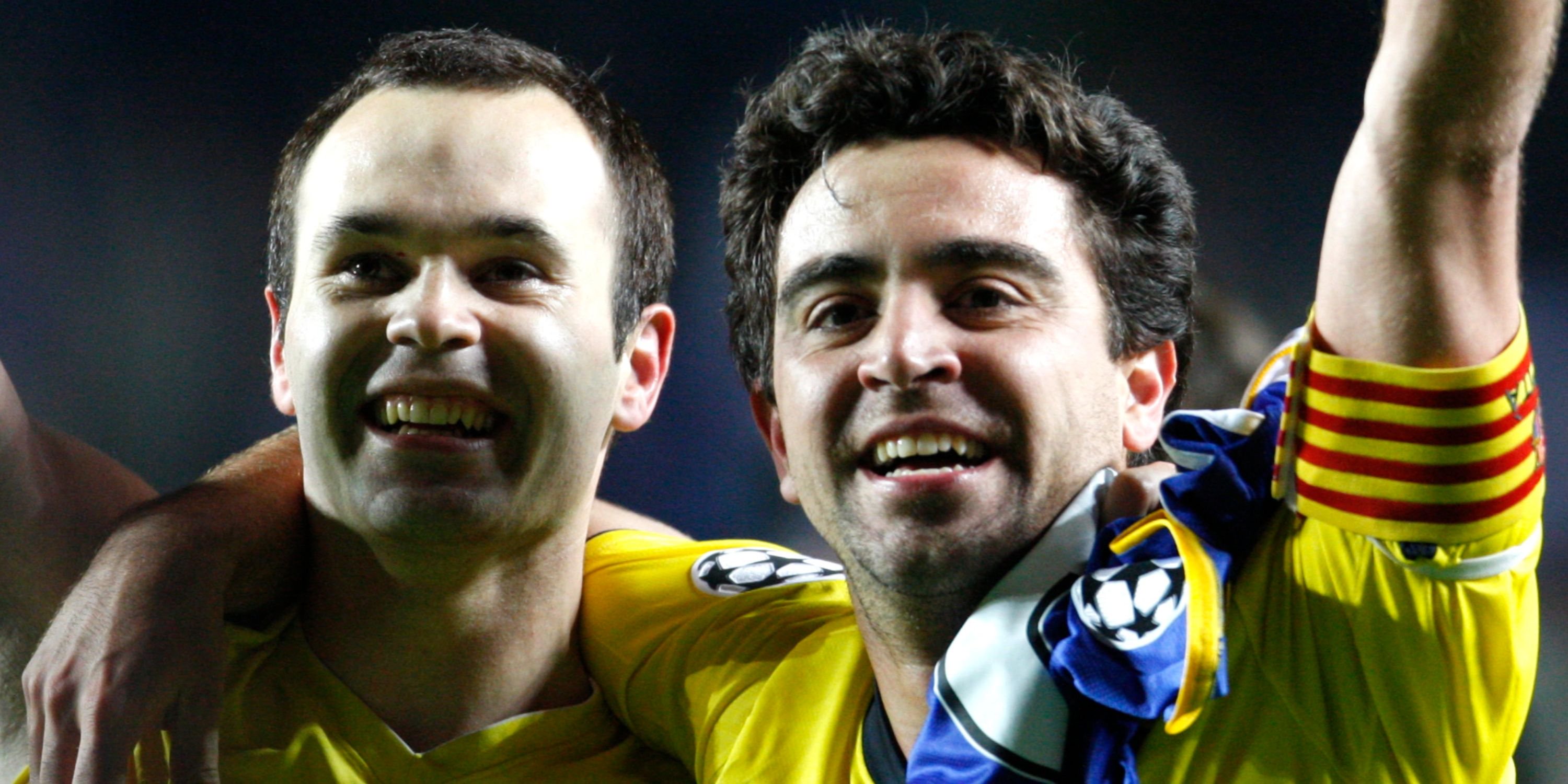 Barcelona duo Andres Iniesta and Xavi celebrating
