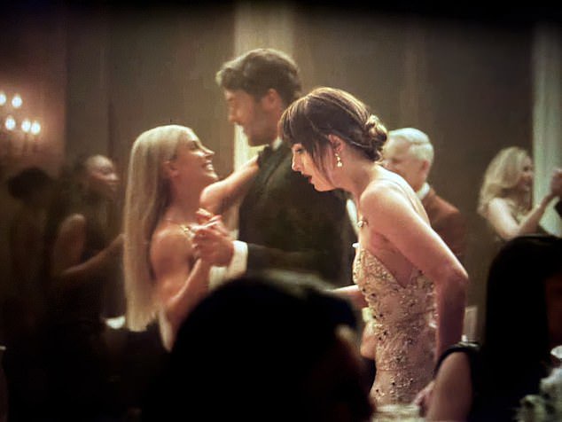 The veteran signal caller and his wife, Kelly, were spotted dancing in the background