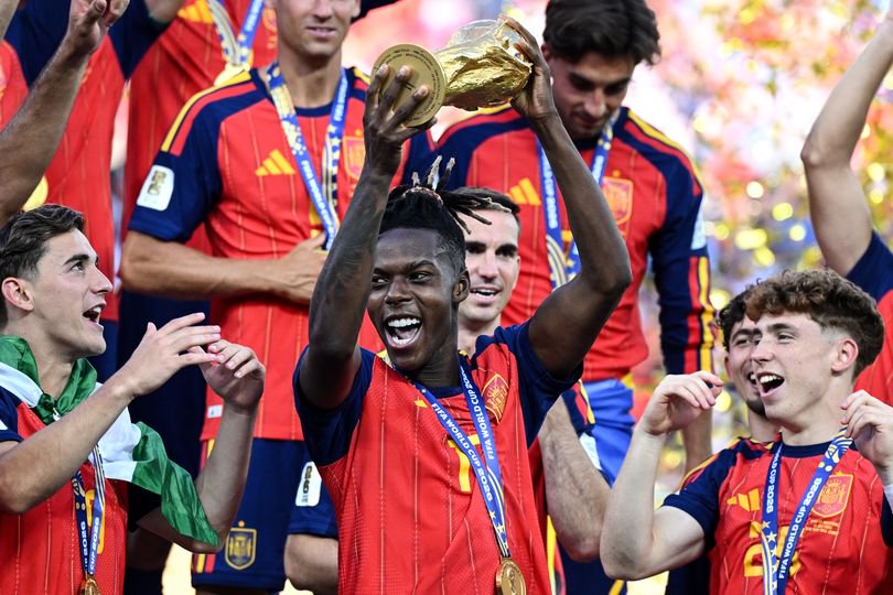 Nico Williams lifting the World Cup trophy