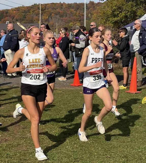 <p>Eventual ninth-place finisher Betsy DiGiovanni (202) from Lake-Lehman is among the runners battling for position early in the Class 2A girls race at the District 2 Championships.</p>
                                 <p>Tom Robinson | For Times Leader</p>