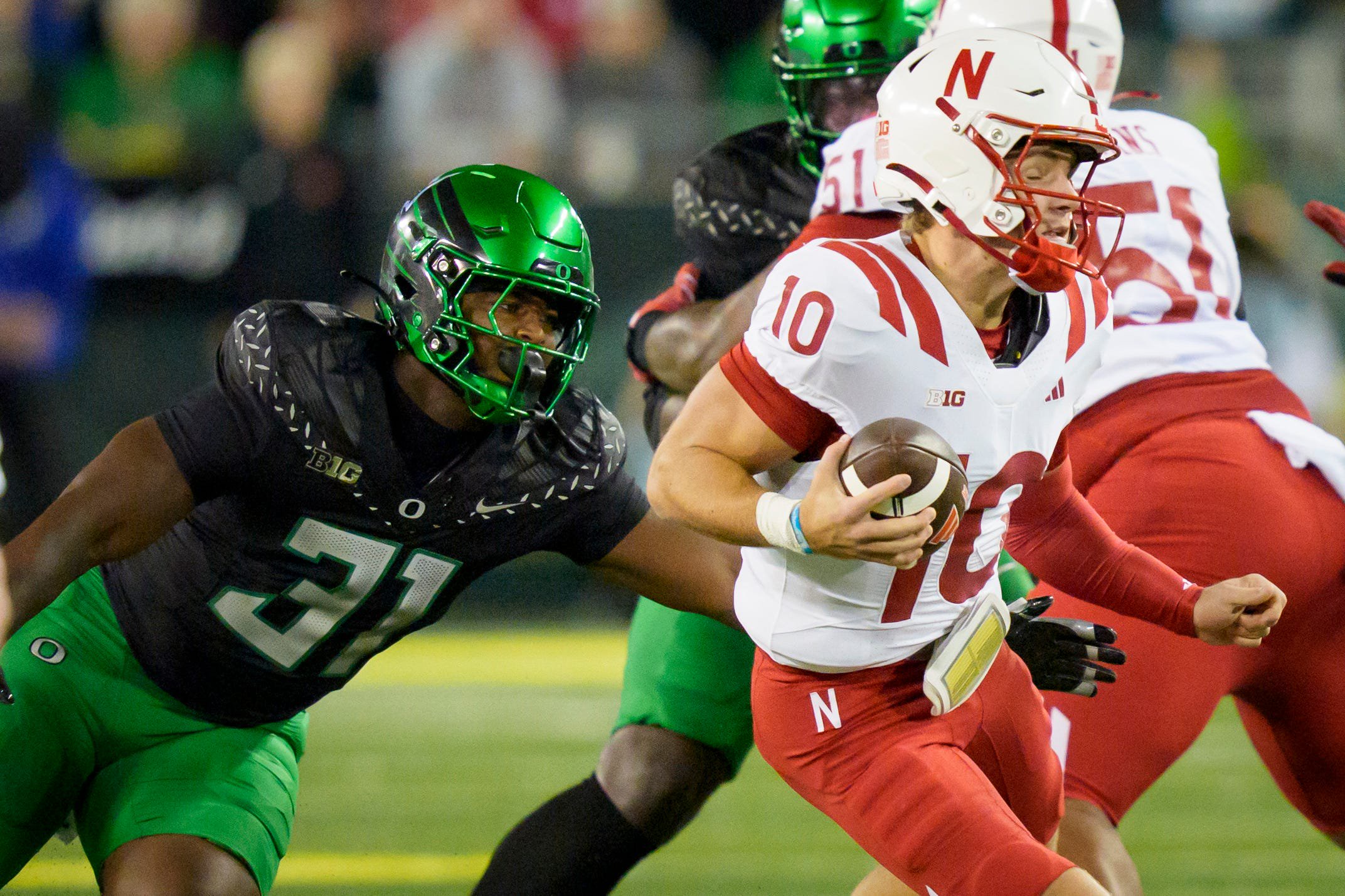 Oregon Ducks outside linebacker Nasir Wyatt, left, tackles Nebraska Cornhuskers quarterback Anthony Colandrea as the Oregon Ducks host the Nebraska Cornhuskers on Oct. 17, 2026, at Autzen Stadium in Eugene, Oregon.