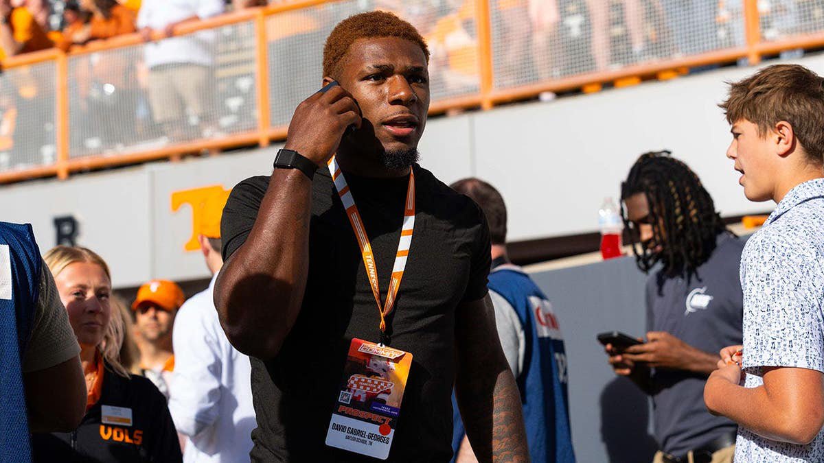 David Gabriel-Georges stands before an NCAA football game at Neyland Stadium.