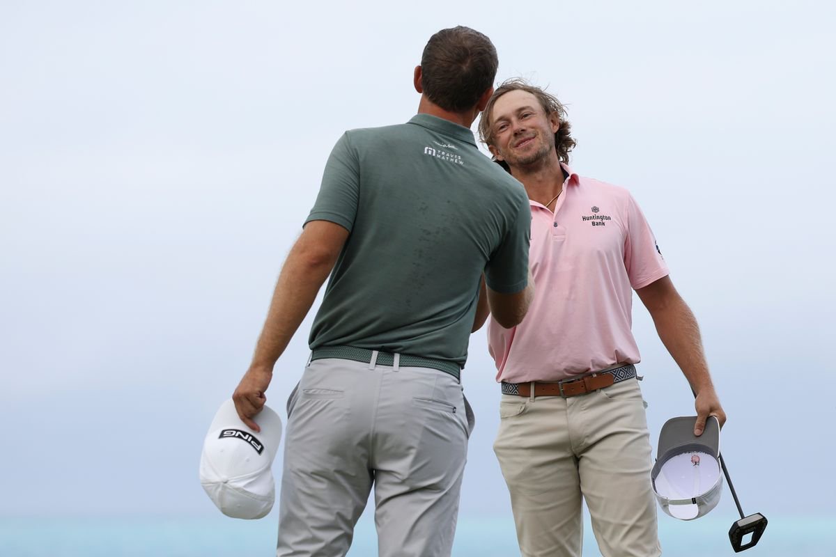 Seamus Power shakes hands with Austin Smotherman