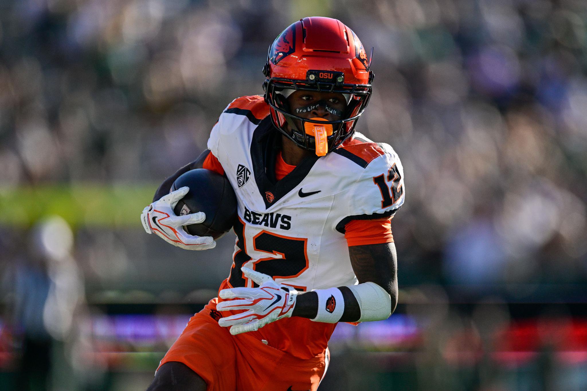 Jesse Legree of the Oregon State Beavers runs with the ball during a game against the Colorado State Rams.