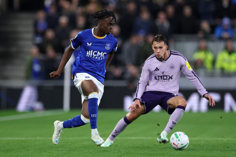 Tyrique George (L) of Everton in action.