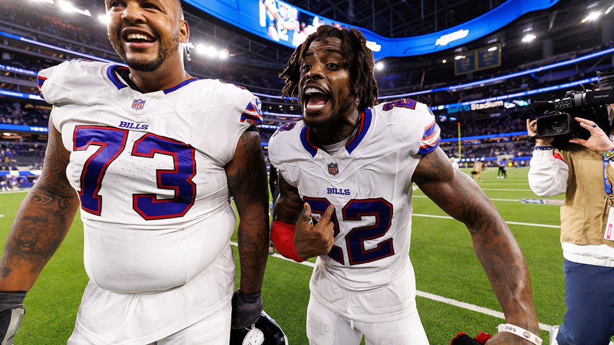 Dion Dawkins and C.J. Gardner-Johnson of the Buffalo Bills celebrate after an NFL game.