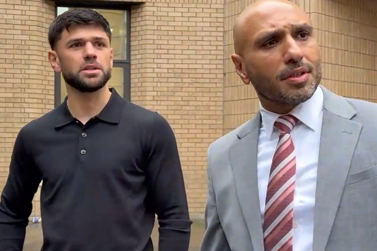 Joe Cordina addresses press outside Cardiff Magistrates' Court alongside lawyer Nadeem Majid