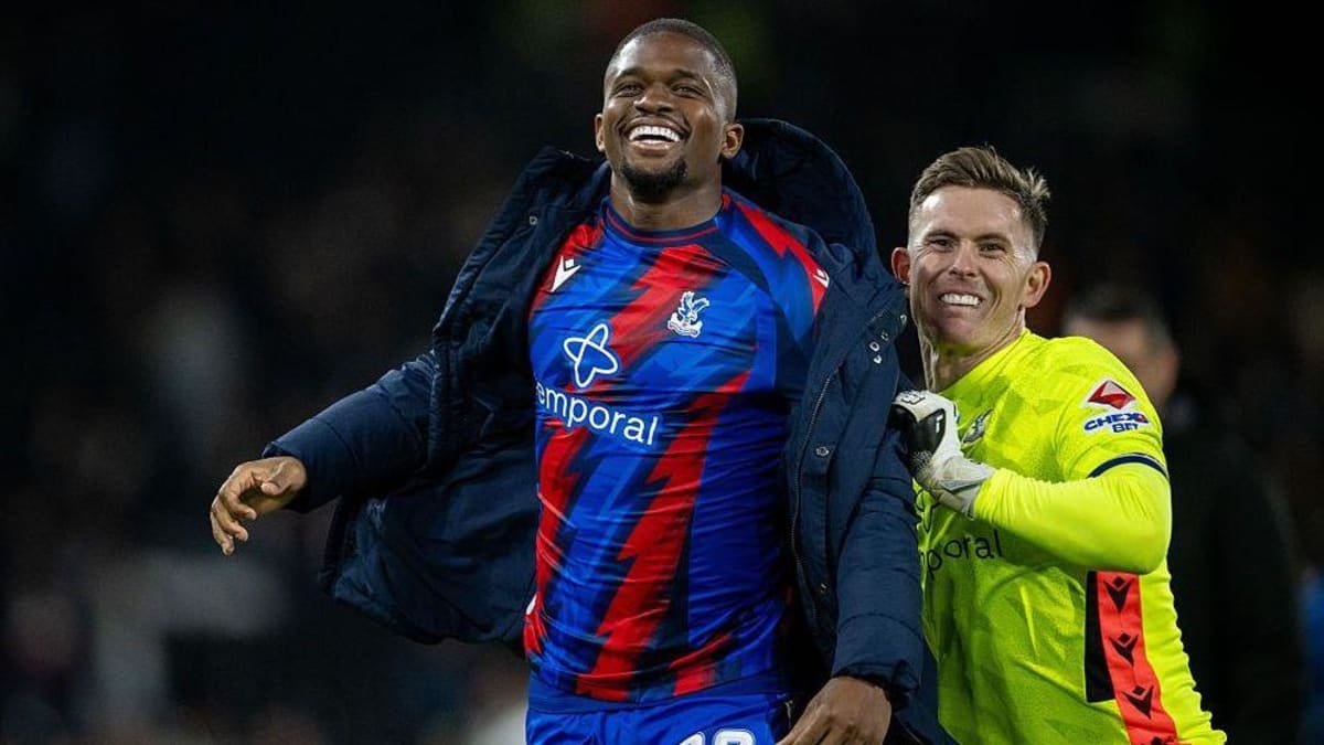 Cheick Doucoure and Dean Henderson celebrate victory for Crystal Palace