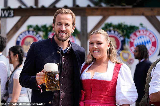 Kane with wife Katie at Oktoberfest in Munich last month