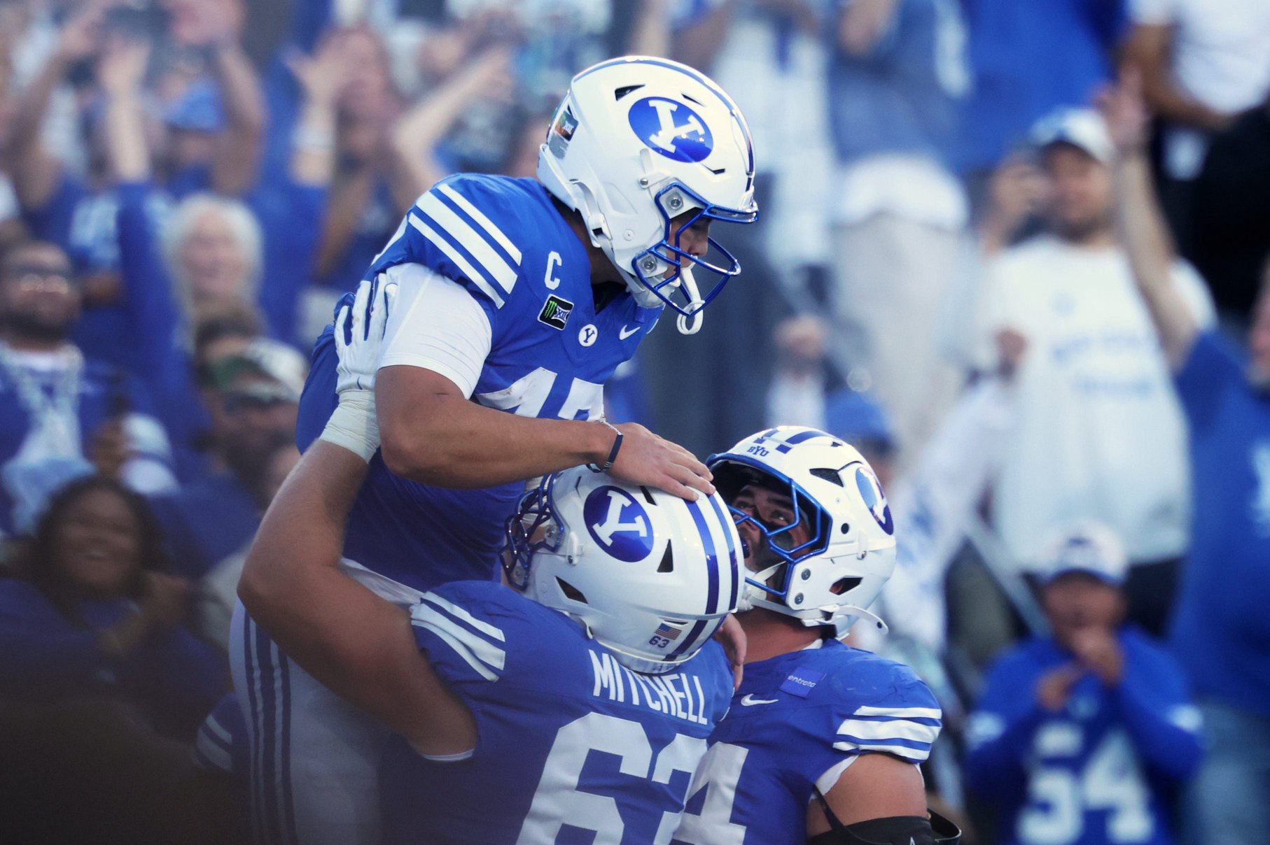Oct 17, 2026; Provo, Utah, USA;  Brigham Young Cougars quarterback Bear Bachmeier (47) celebrates with offensive line Bruce Mitchell (63) after scoring a touchdown against the Notre Dame Fighting Irish during the first halfat LaVell Edwards Stadium.  Mandatory Credit: Rob Gray-Imagn Images
