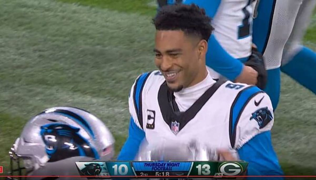 Bryce Young was seen smiling immediately after his interception
