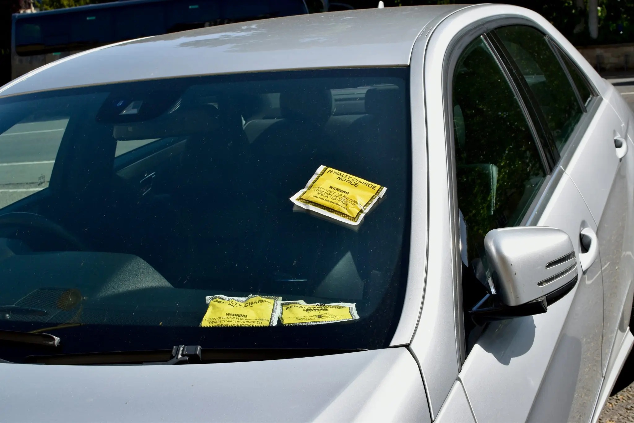 Andy Burnham introduces new rules to tackle 'rip-off' parking charges. Credit: Unsplash, Samuel Isaacs
