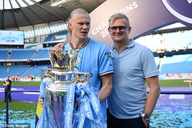 The father and son duo celebrate after the latter's Premier League title win in the 2022-23 term