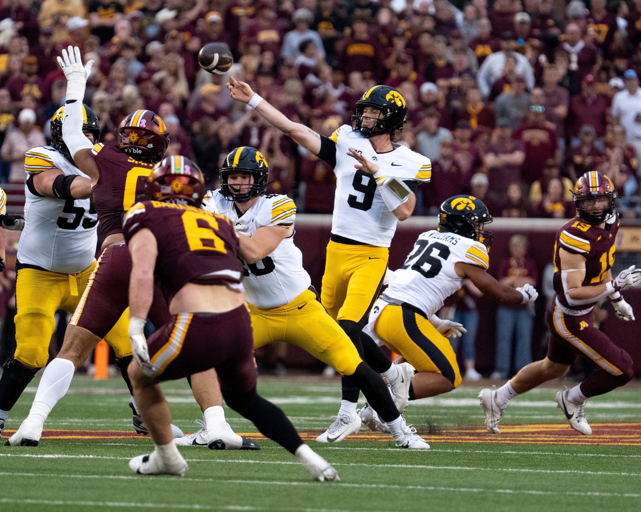 Iowa Hawkeyes quarterback Hank Brown (9) throws a pass during a Big Ten football game against the Minnesota Golden Gophers in Minneapolis, Minnesota, on Oct. 24, 2026.
