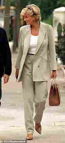 Diana pictured leaving La Famiglia in Chelsea after having lunch with Prince William in August 1997