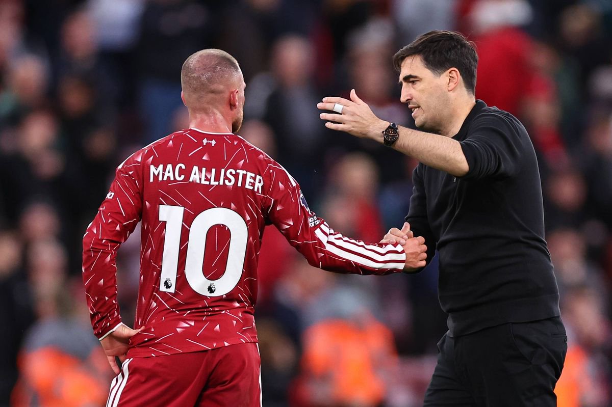 LIVERPOOL, ENGLAND - OCTOBER 11: Andoni Iraola, Manager / Head Coach of Liverpool consoles Alexis Mac Allister during the Premier League 2026/27 match between Liverpool FC and Manchester City at Anfield on October 11, 2026 in Liverpool, England. (Photo by Robbie Jay Barratt - AMA/Getty Images)