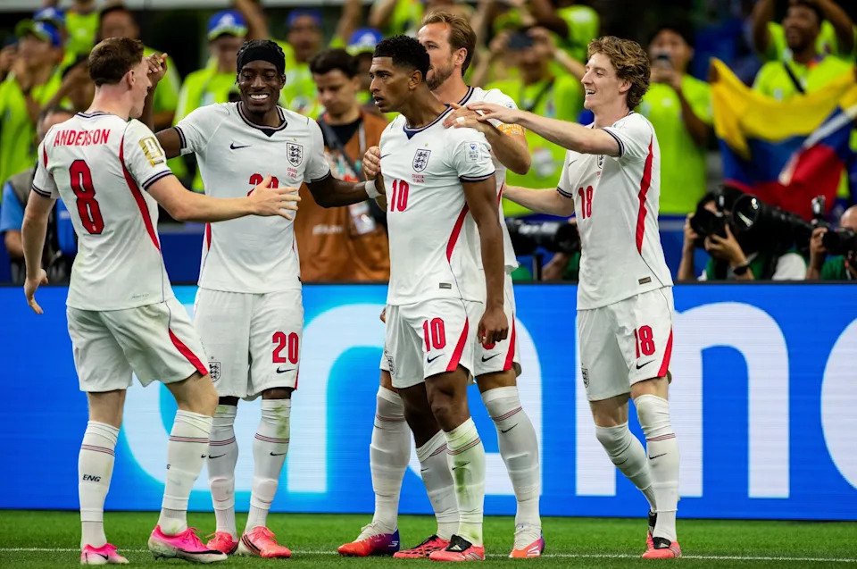 Jude Bellingham (centre) celebrates with England team-mates after scoring team's third goal