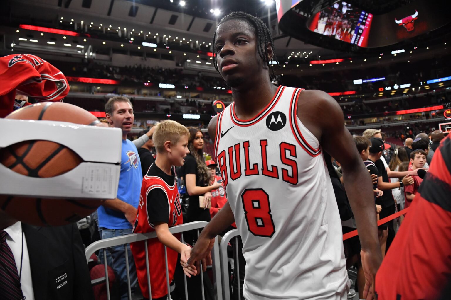 Chicago, Illinois, USA; Chicago Bulls forward Caleb Wilson (8) high fives fans after his team's victory over the Phoenix Suns at United Center. Mandatory Credit: Patrick Gorski-Imagn Images