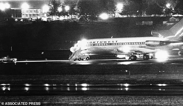 The hijacked Northwest Airlines jetliner 727 sits on a runway in Washington in 1971