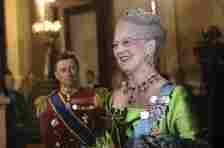 Queen Margrethe wearing green dress and emerald jewels
