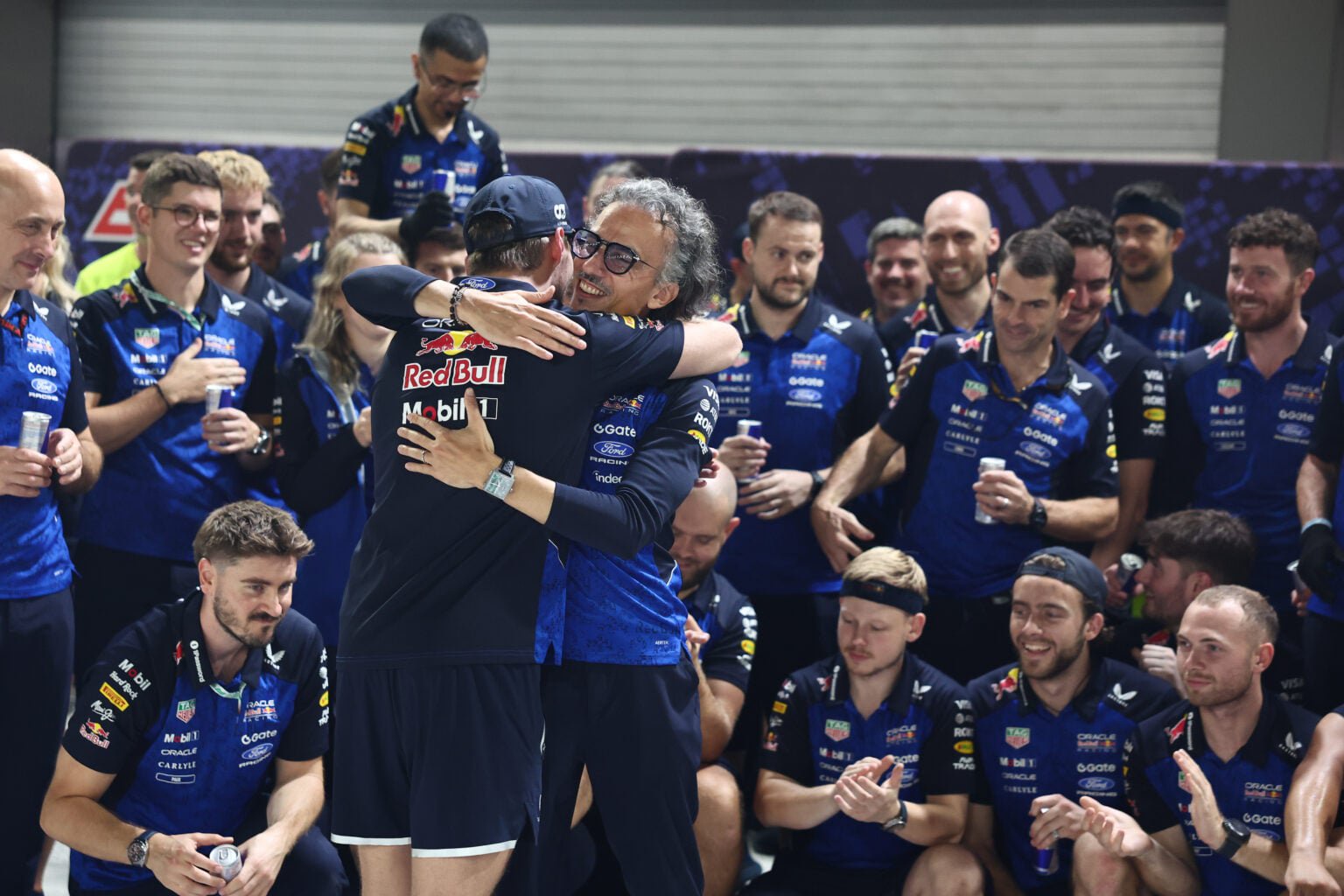 Red Bull team principal Laurent Mekies congratulates Max Verstappen after winning the 2026 F1 Singapore Grand Prix