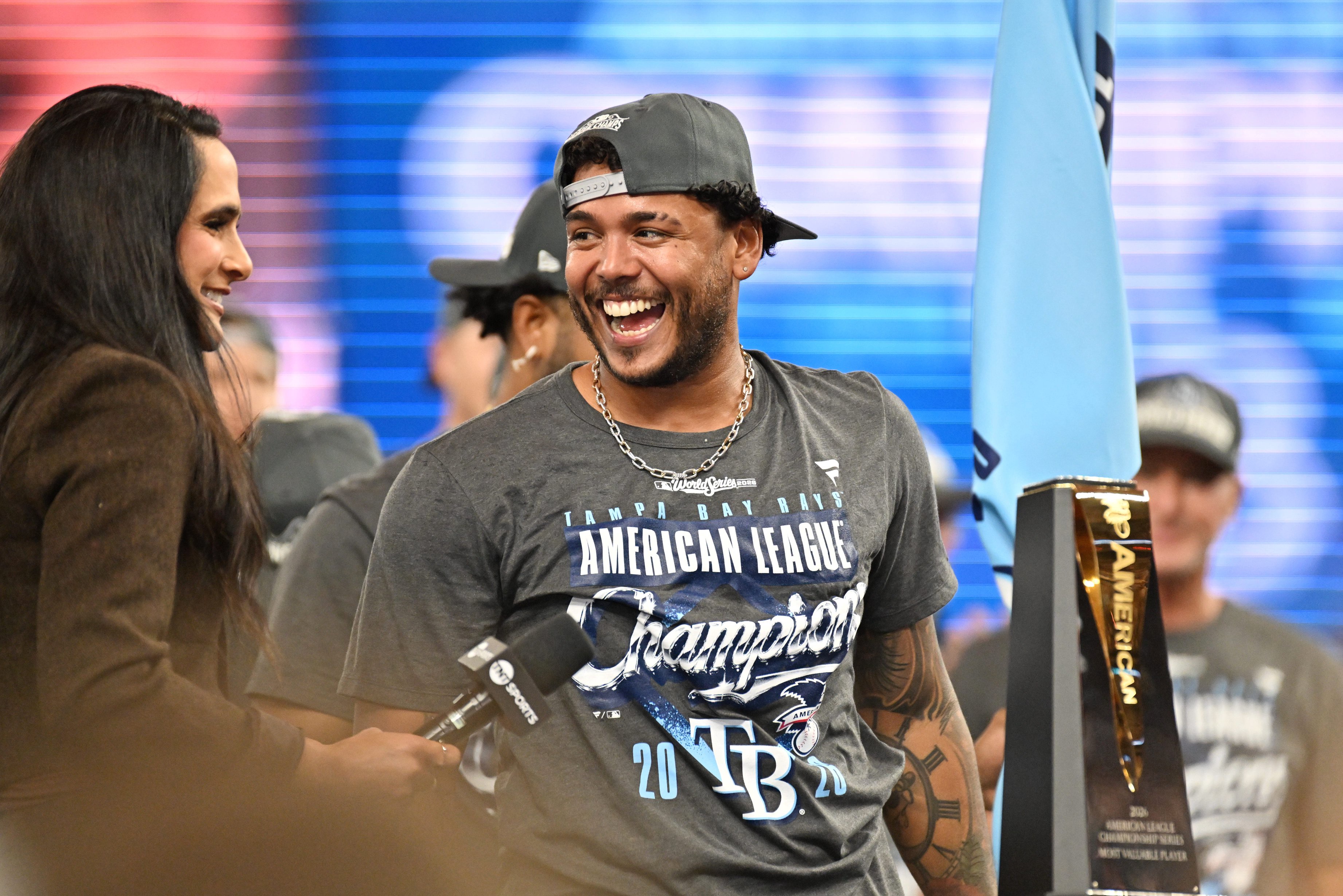 Oct 19, 2026; St. Petersburg, Florida; Tampa Bay Rays pitcher Freddy Peralta celebrates on the podium after defeating the Cleveland Guardians in Game 6 of the ALCS at Tropicana Field.