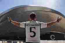 Real Madrid fan Yoa Tamayo poses in front of the Bernabeu