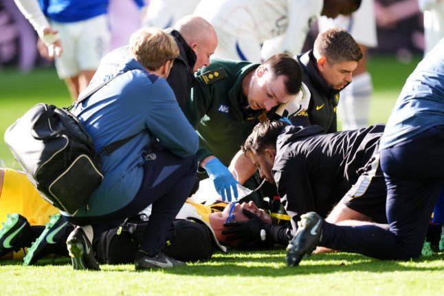 Chelsea goalkeeper Emiliano Martinez receives treatment for an injury during the Premier League match at the Hill Dickinson Stadium, Liverpool. Picture date: Saturday October 17, 2026. PA Photo. Photo credit should read: Mike Egerton/the Press Association. RESTRICTIONS: EDITORIAL USE ONLY No use with unauthorised audio, video, data, fixture lists, club/league logos or "live" services. Online in-match use limited to 120 images, no video emulation. No use in betting, games or single club/league/player publications.